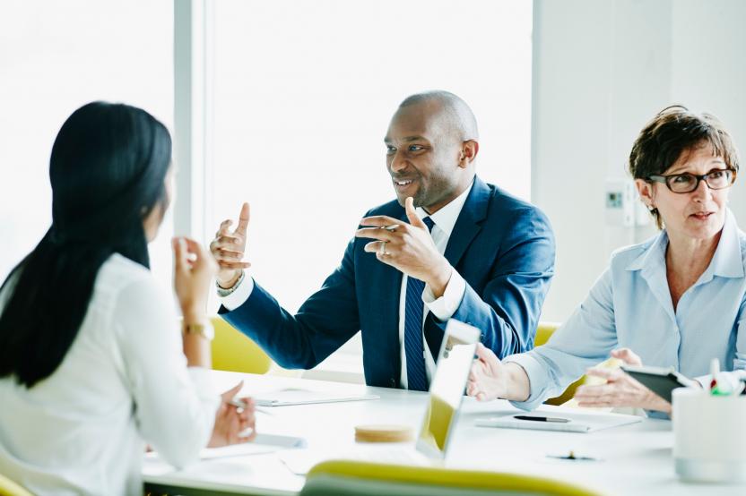 Businessman in discussion with colleagues